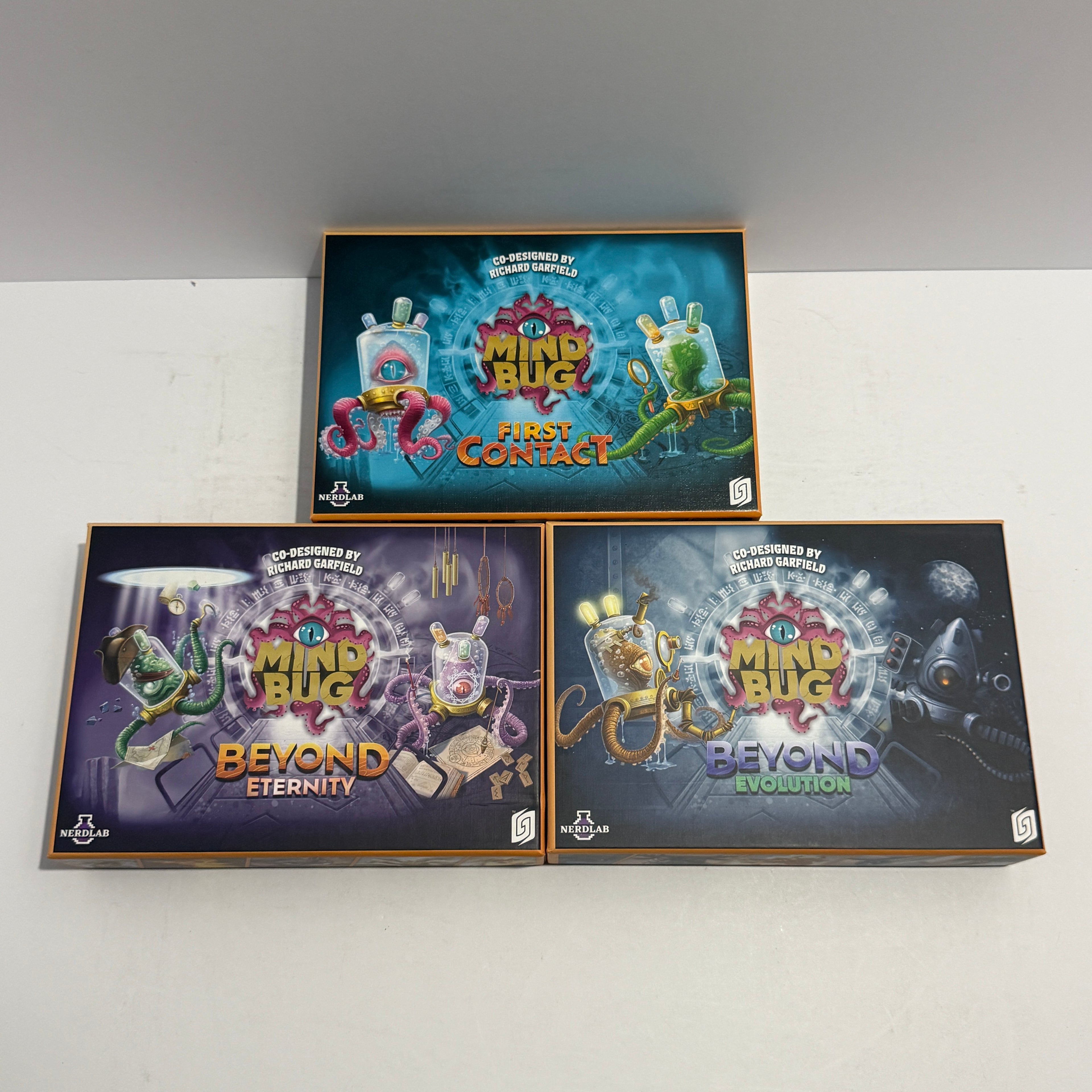 Mindbug Board Game Bundle (First Contact, Beyond Evolution, Beyond Eternity)